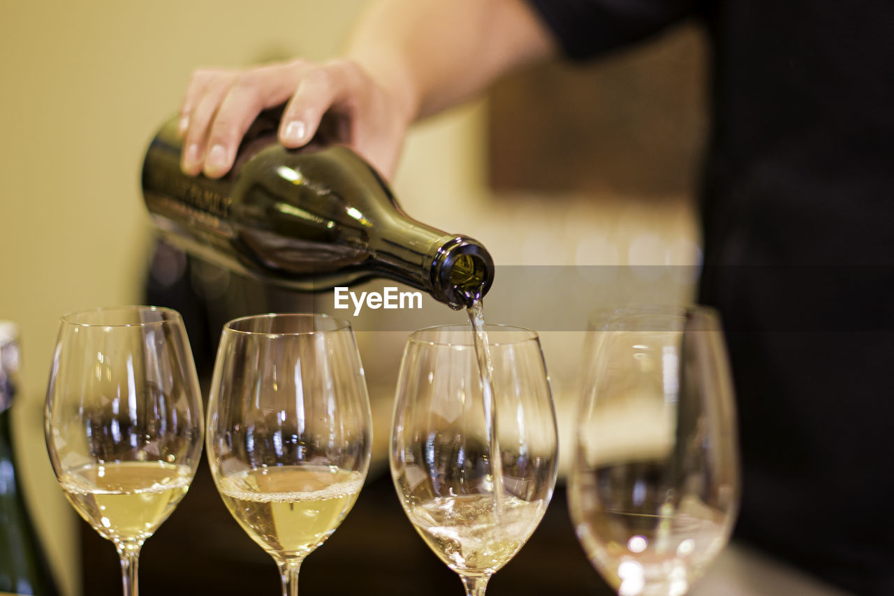 MIDSECTION OF WINEGLASS ON GLASS