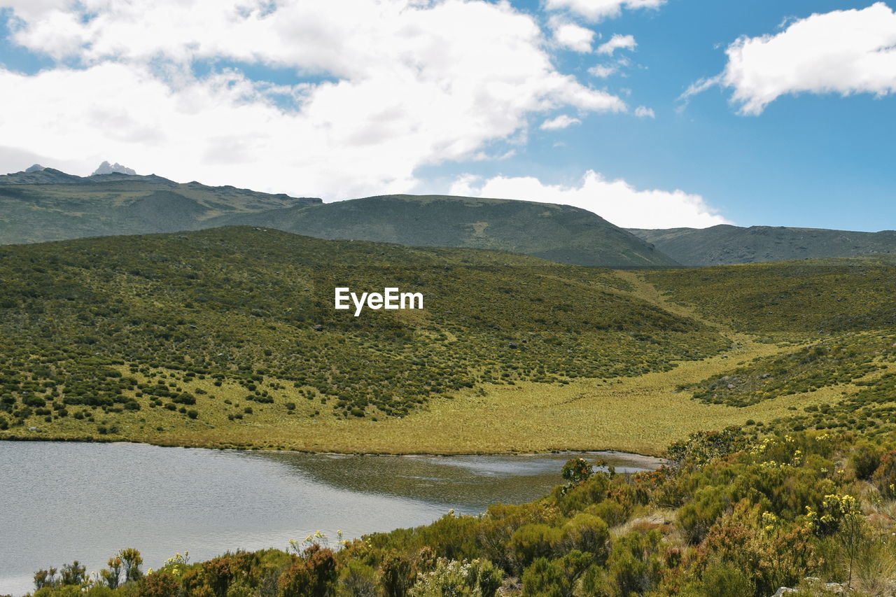 Scenic lake against a mountain background, lake ellis, mount kenya national park 