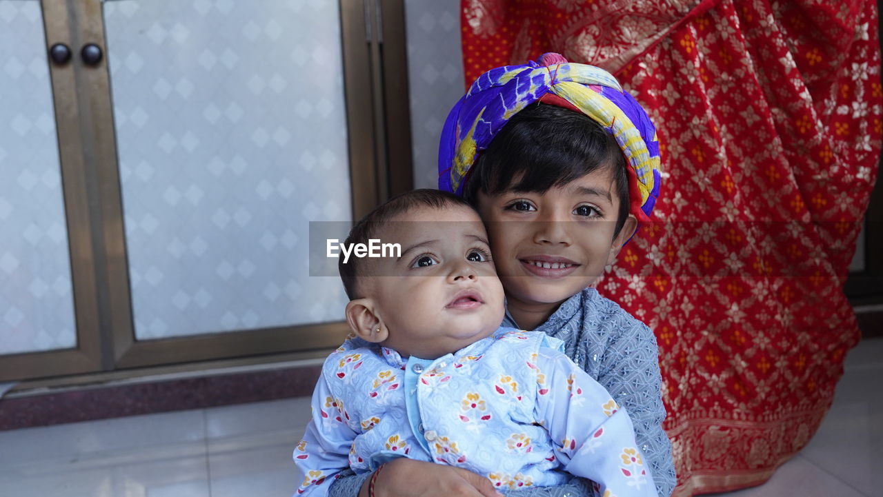 child, childhood, two people, togetherness, family, portrait, female, emotion, women, bonding, person, looking at camera, happiness, men, love, smiling, positive emotion, innocence, adult, baby, cute, parent, toddler, lifestyles, indoors, clothing, one parent, embracing, day, casual clothing, human face, cheerful