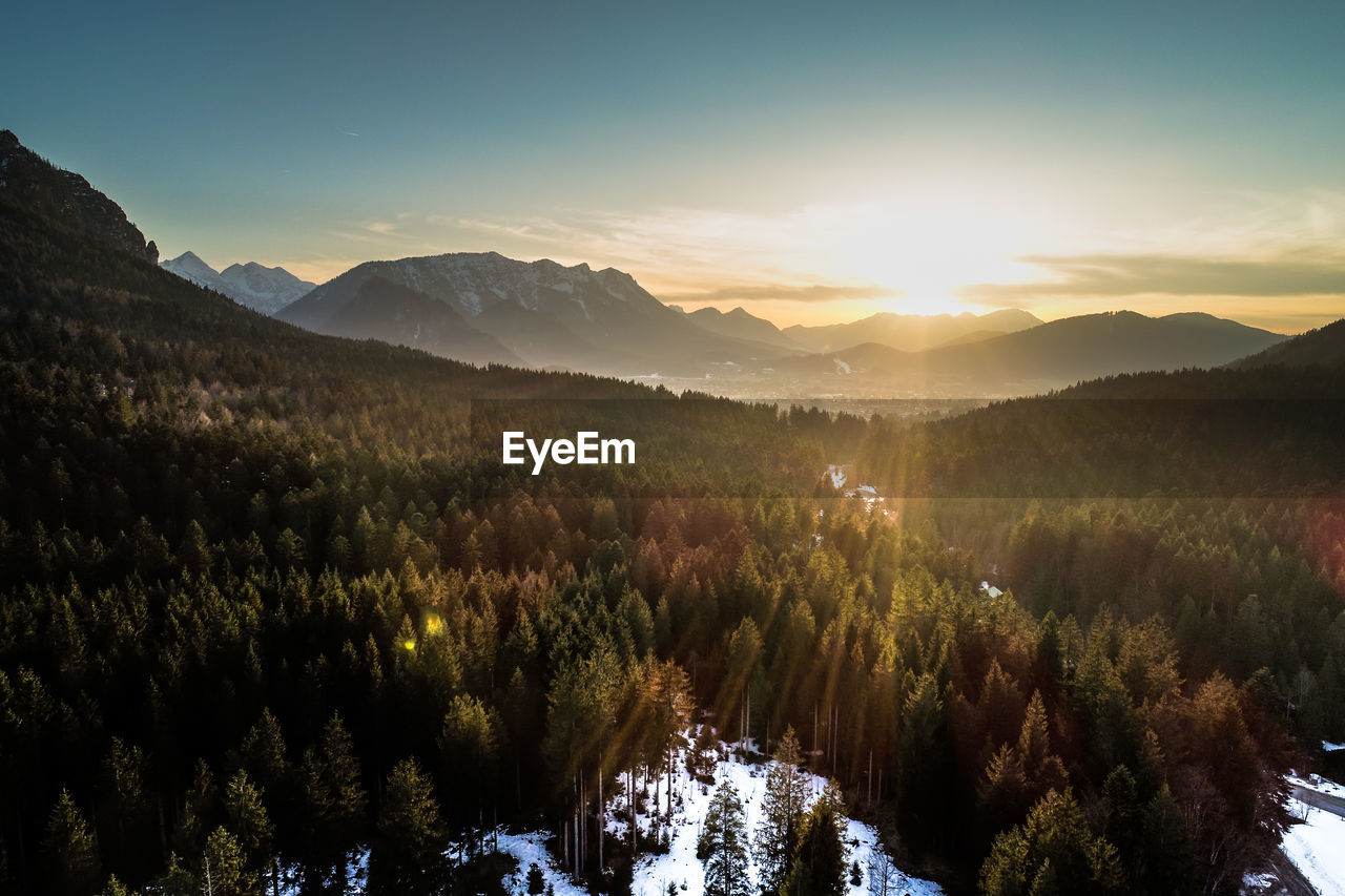 Scenic view of mountains against sky during sunset