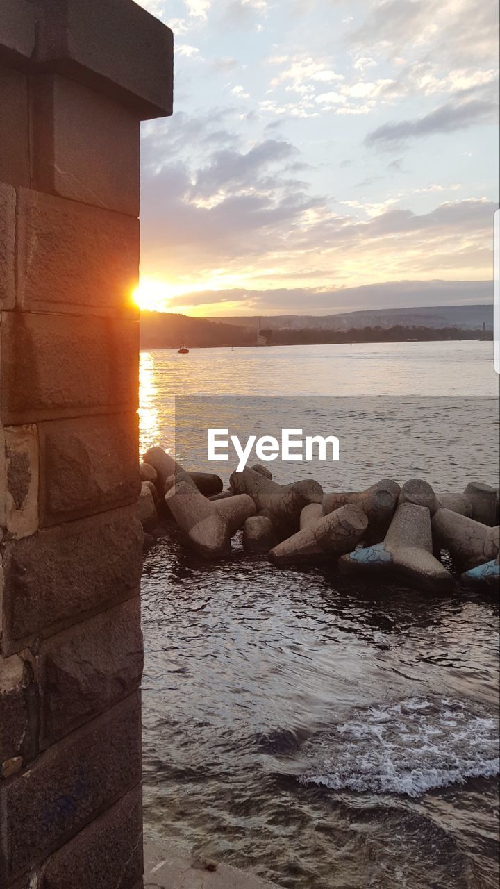 SCENIC VIEW OF SEA DURING SUNSET