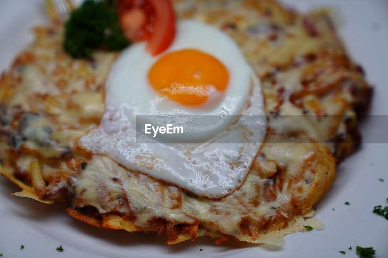 CLOSE-UP OF BREAKFAST SERVED IN PLATE WITH SAUCE