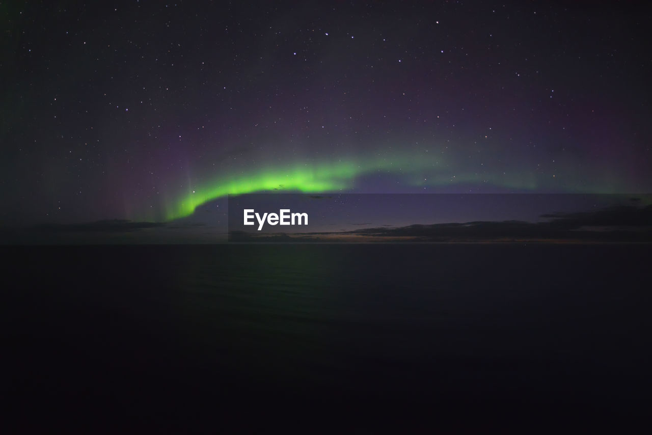 Northern lights over the sea at iceland