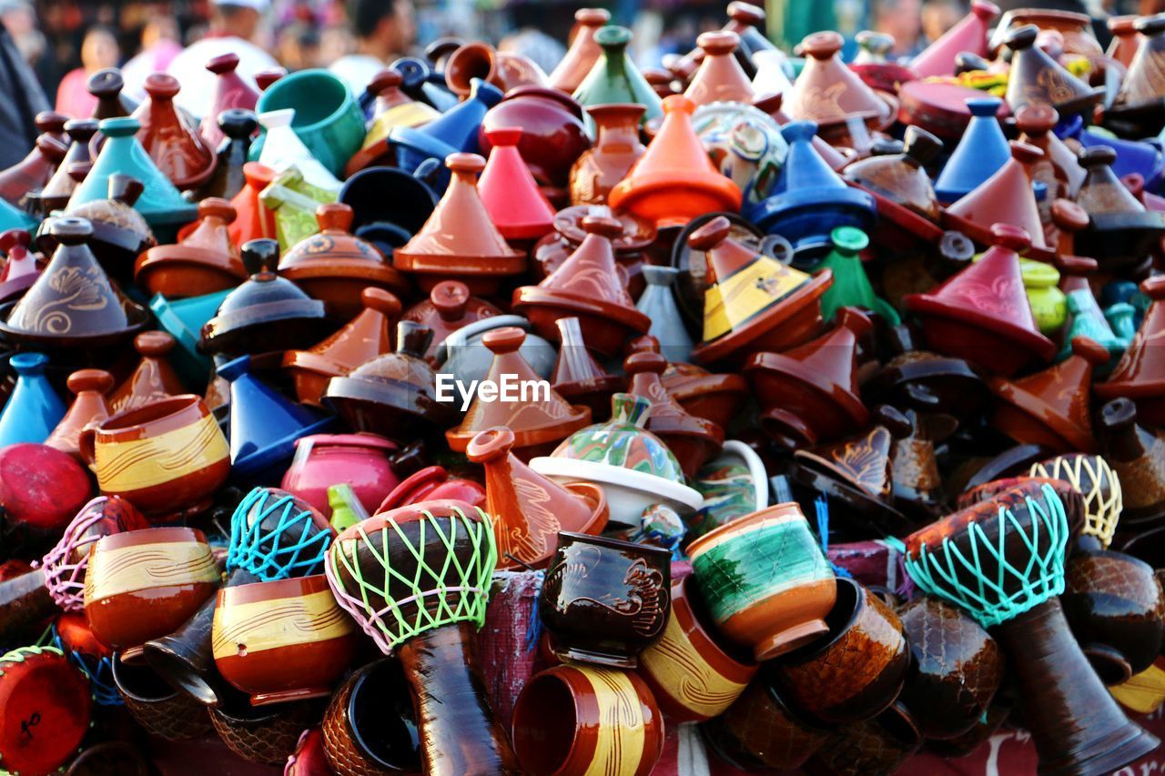 High angle view of multi colored tajine for sale in market