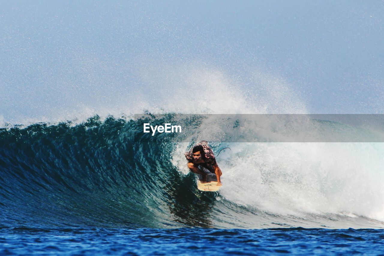 Man surfing in sea