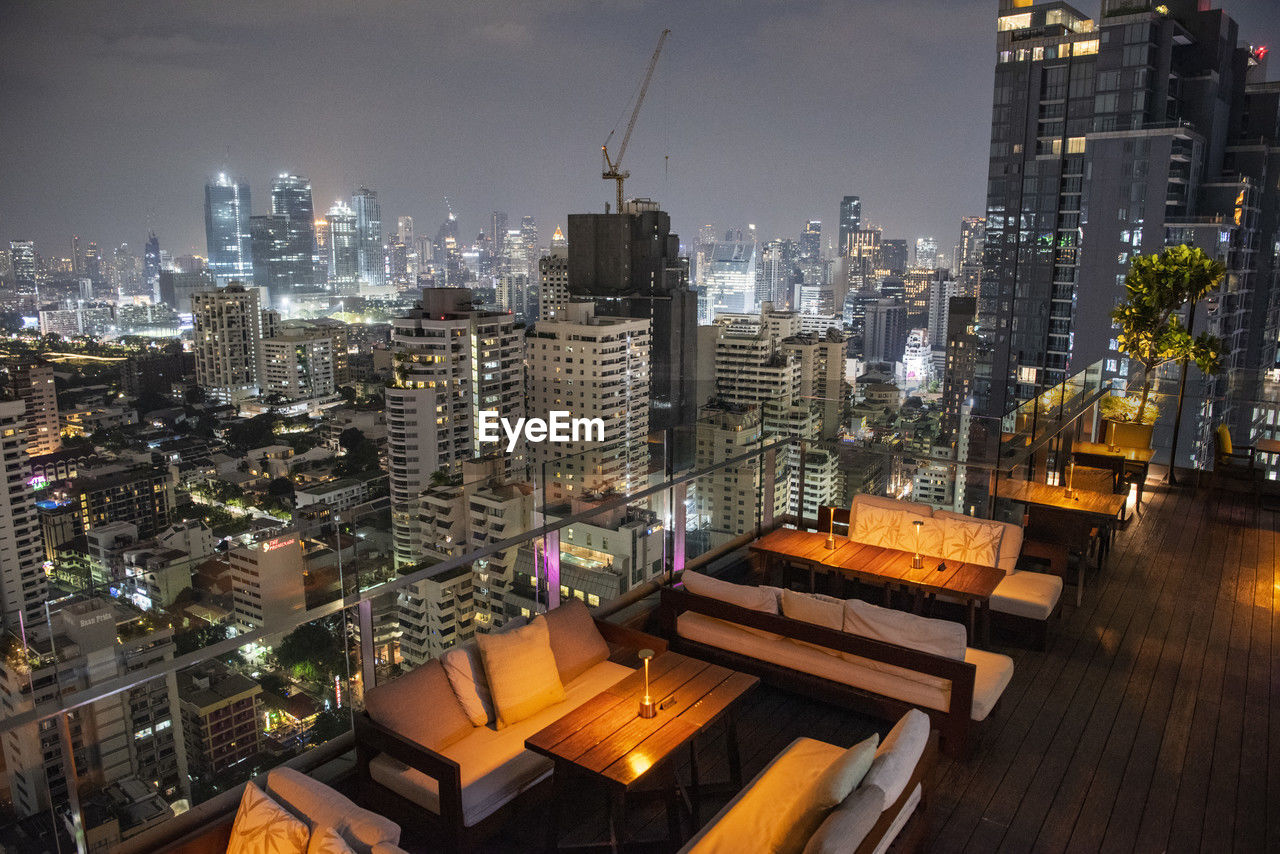 high angle view of illuminated buildings in city