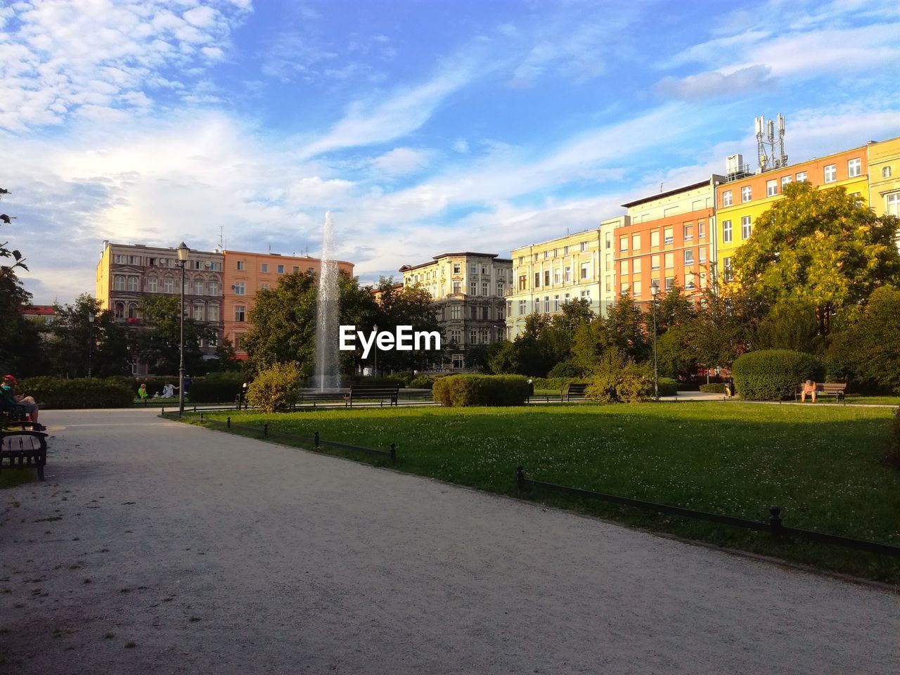 Park in city against sky