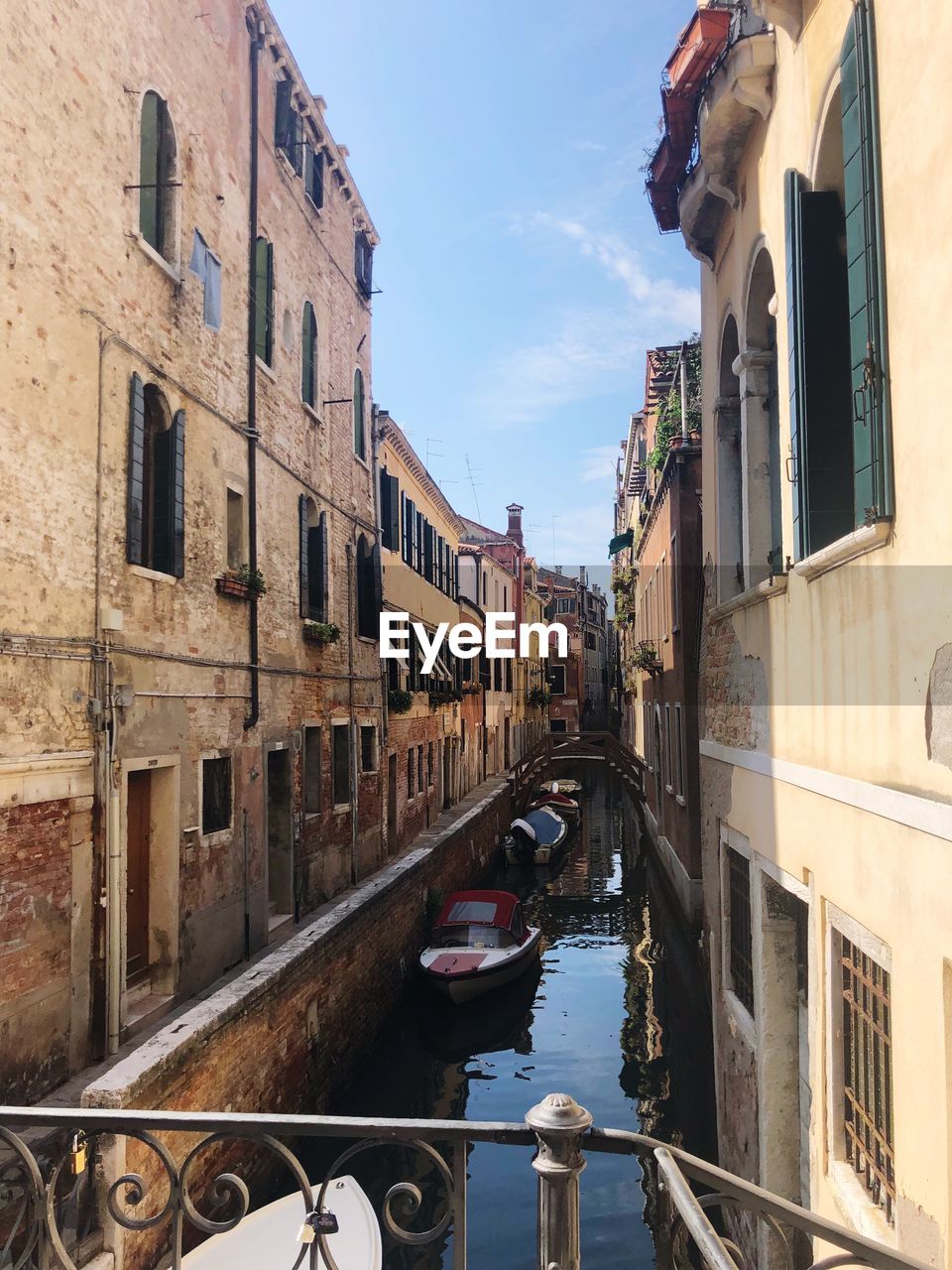 Canal amidst buildings in city