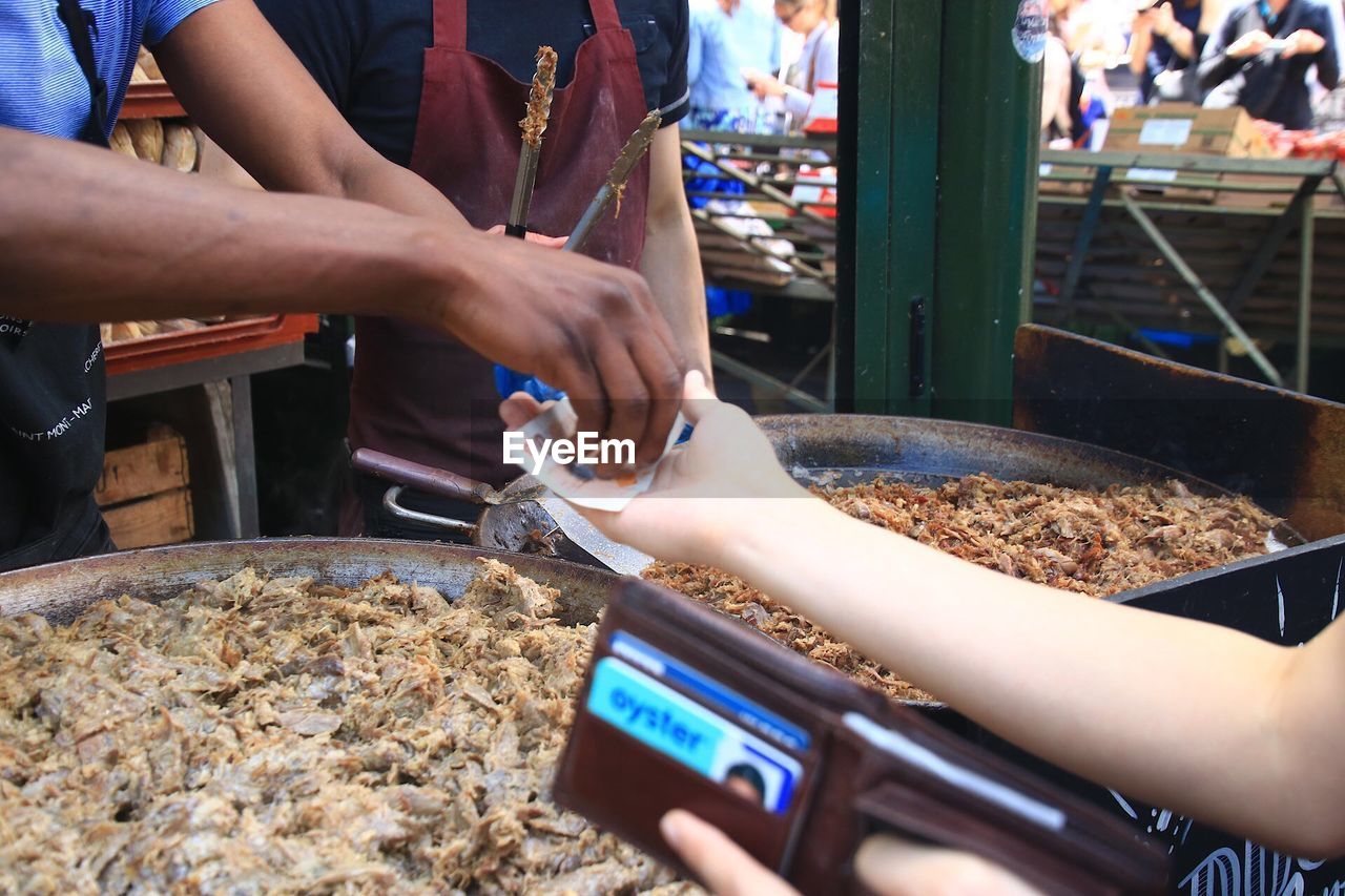 Customer paying vendor in market