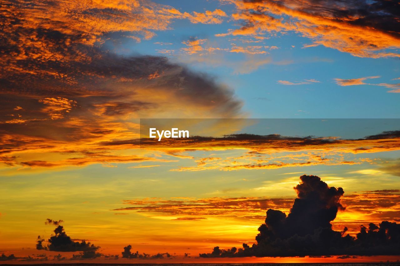 Scenic view of dramatic sky during sunset