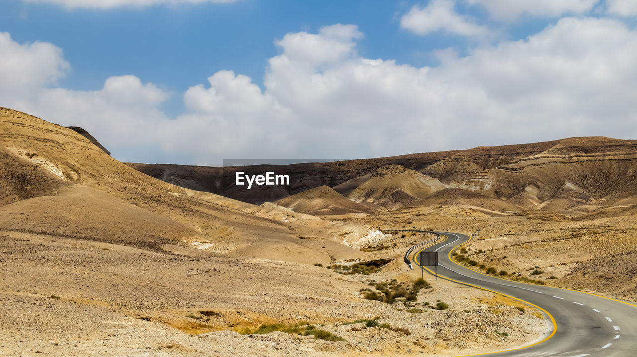 SCENIC VIEW OF MOUNTAIN AGAINST SKY