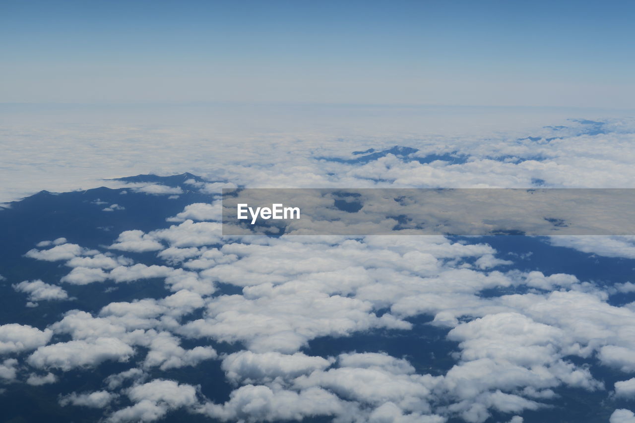 AERIAL VIEW OF CLOUDS IN BLUE SKY