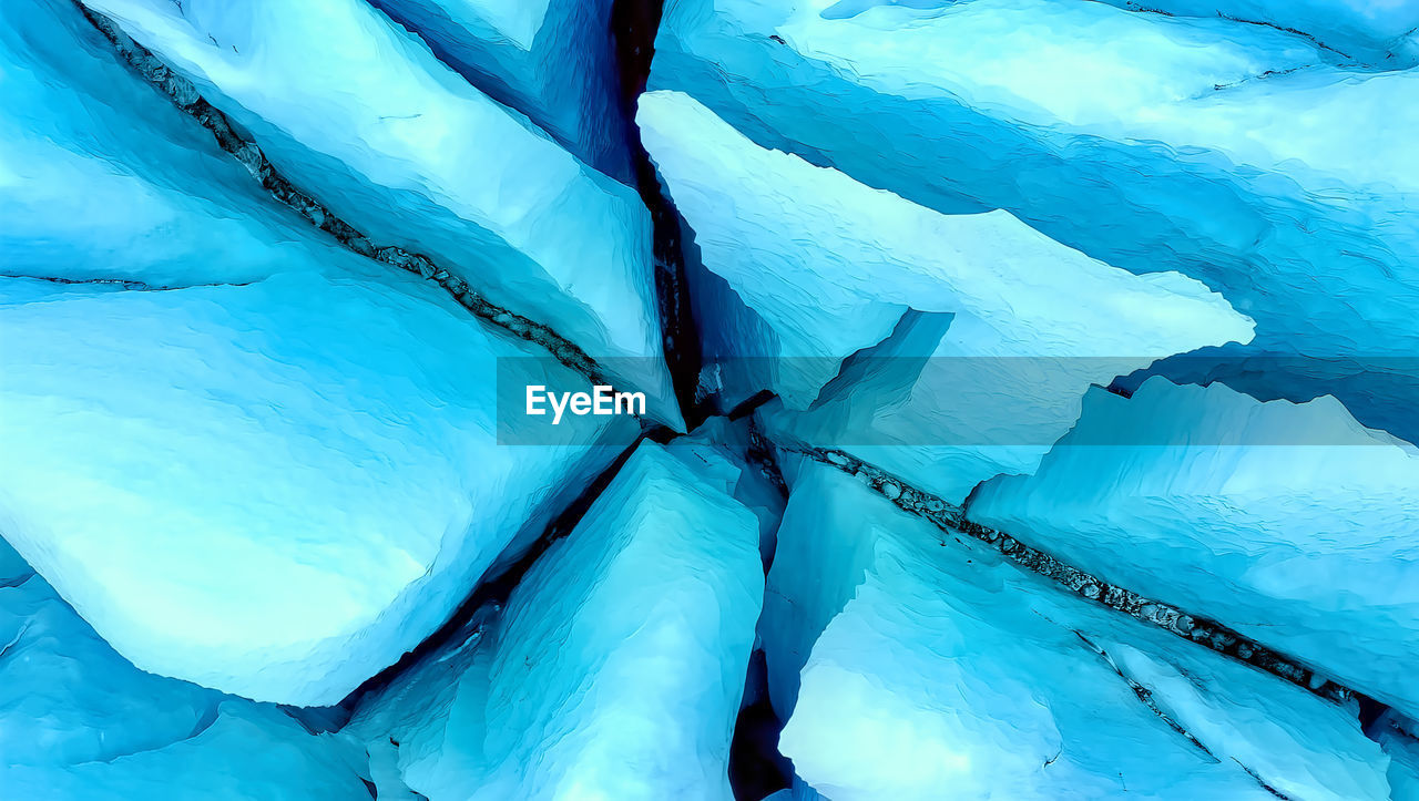 Iceberg floating in greenland fjord.