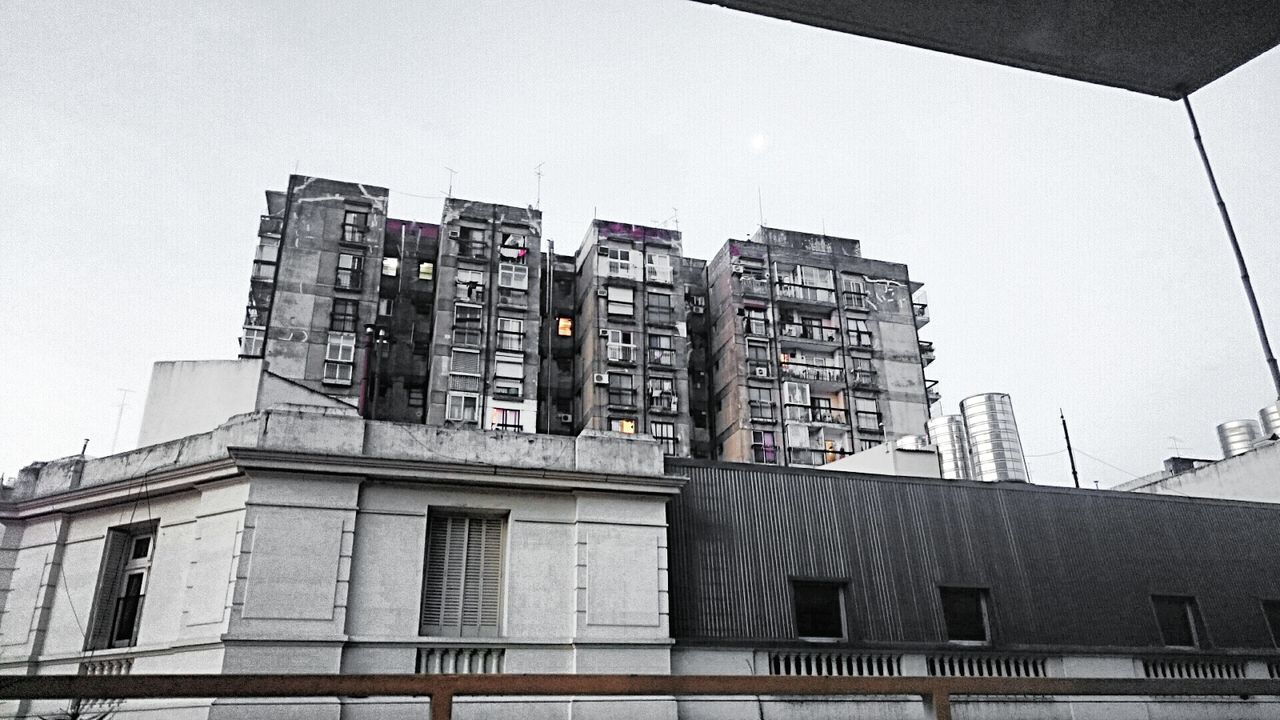 LOW ANGLE VIEW OF BUILDINGS IN CITY