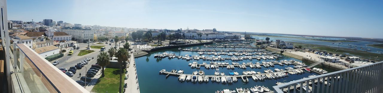 High angle view of boats moored at harbor