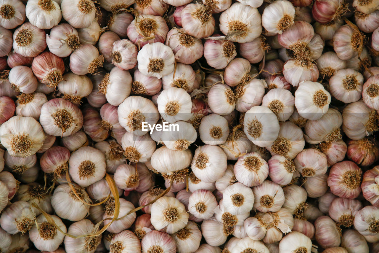 Full frame shot of garlic at market for sale