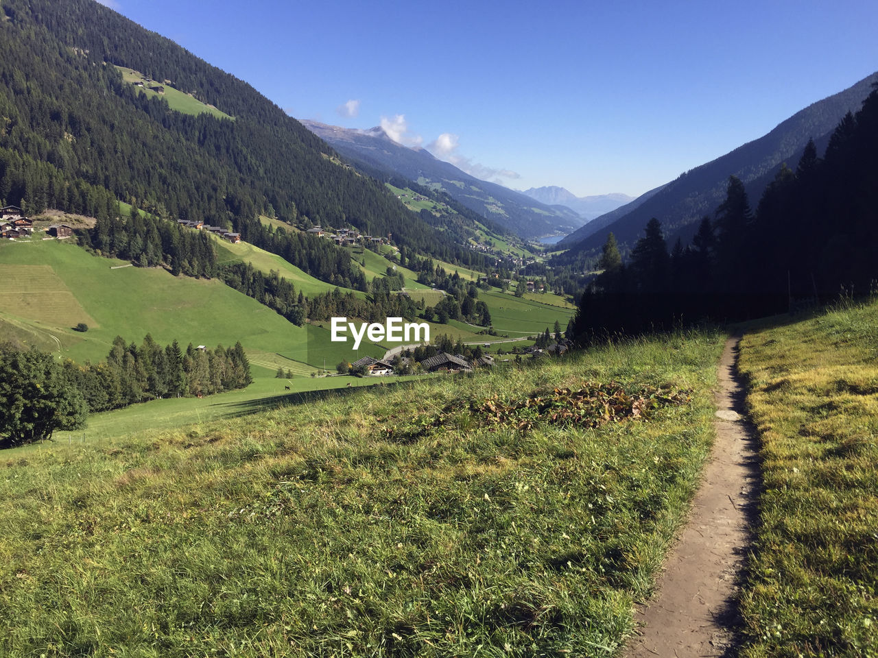 Scenic view of landscape and mountains against sky