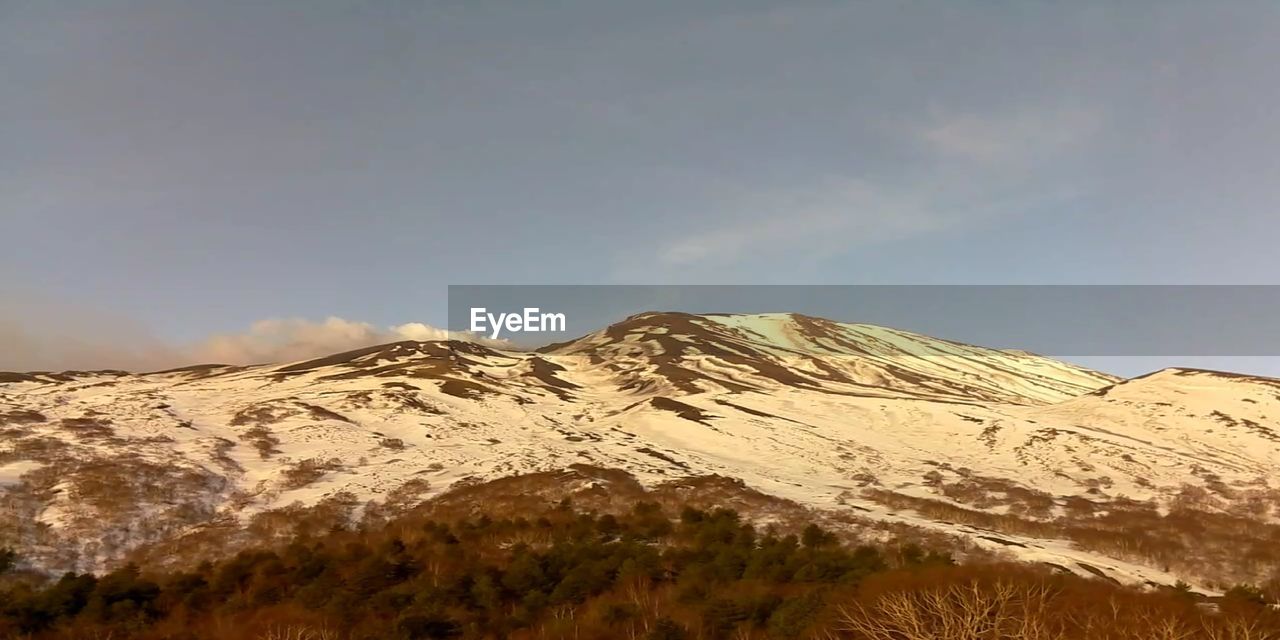 LOW ANGLE VIEW OF MOUNTAIN AGAINST SKY