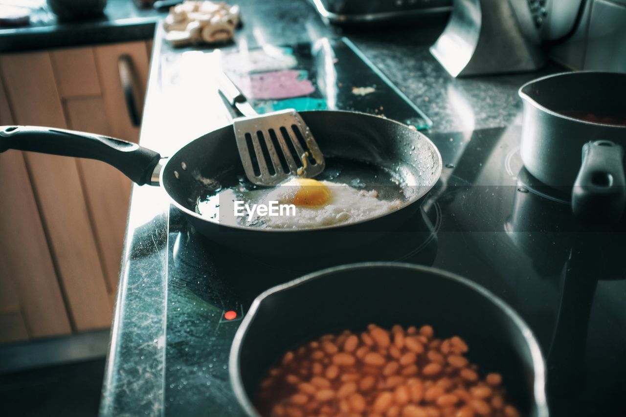 High angle view of breakfast being cooked in kitchen