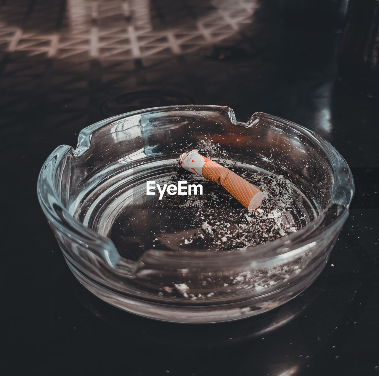 ashtray, cigarette, bad habit, social issues, smoking issues, cigarette butt, tobacco products, warning sign, no people, sign, risk, glass, indoors, ash, table, communication, burnt, close-up, smoking, container, still life, water, high angle view, smoke