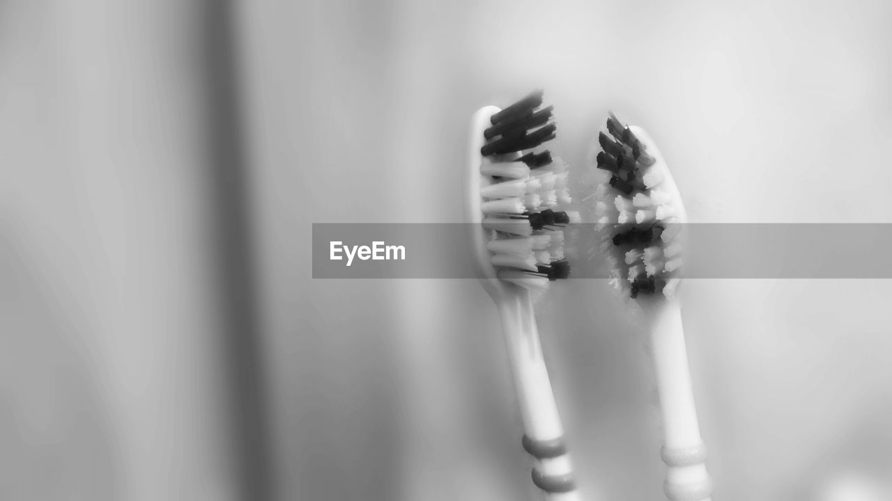 CLOSE-UP OF KITCHEN UTENSILS OVER WHITE BACKGROUND