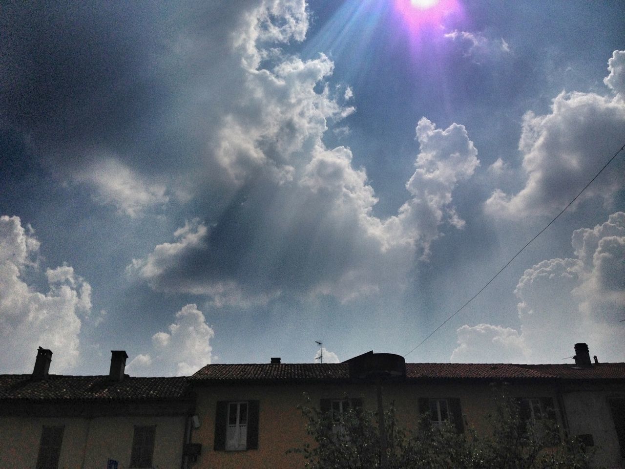 LOW ANGLE VIEW OF BUILDINGS AGAINST SKY