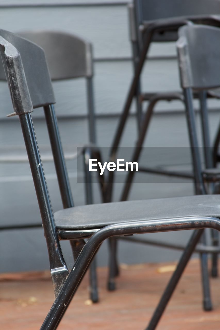 Empty chairs at outdoor cafe