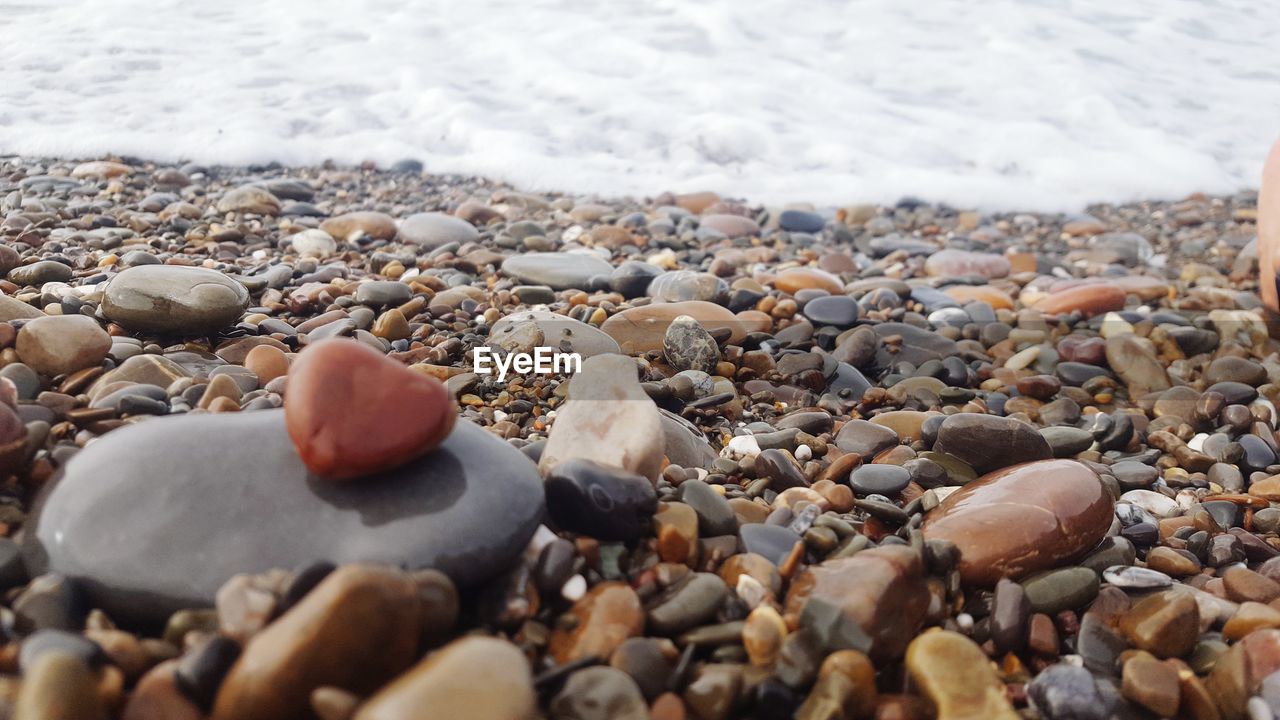 Close-up of stones on beach