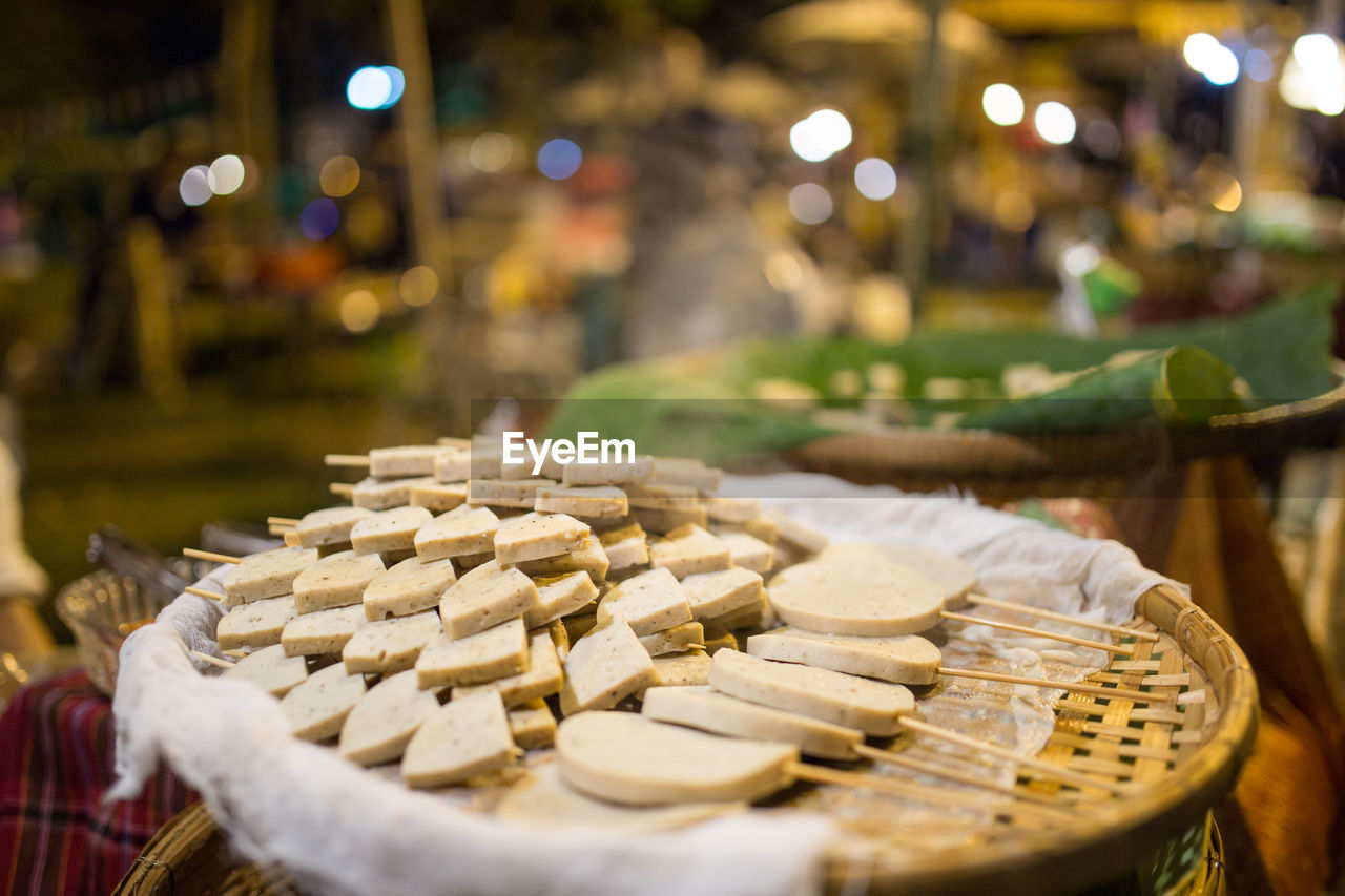 High angle view of street food for sale at market stall during night