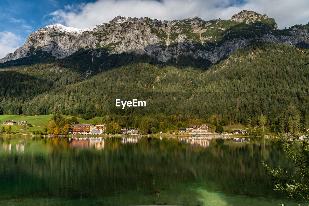 SCENIC VIEW OF LAKE AND MOUNTAINS