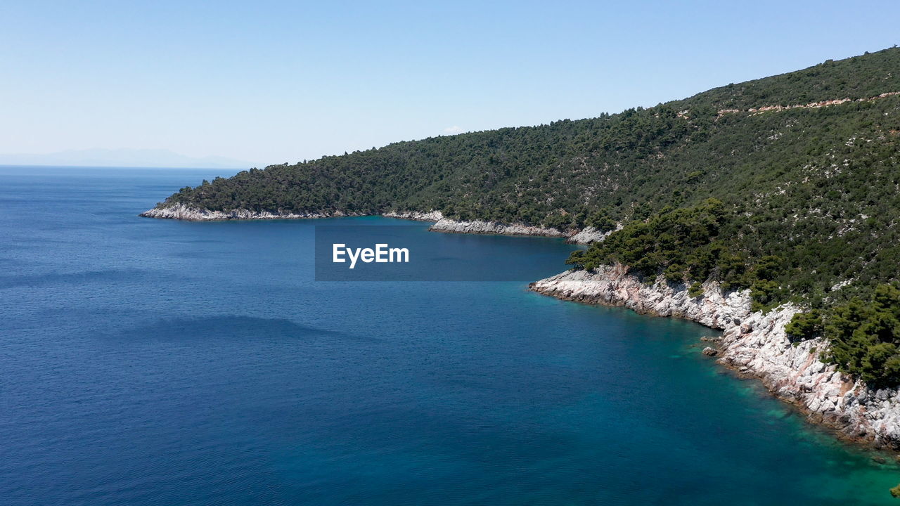 Scenic view of sea against clear sky.