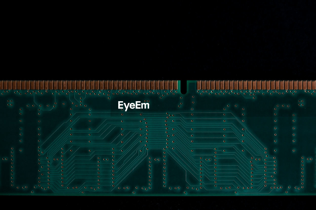 Close-up of computer chip against black background