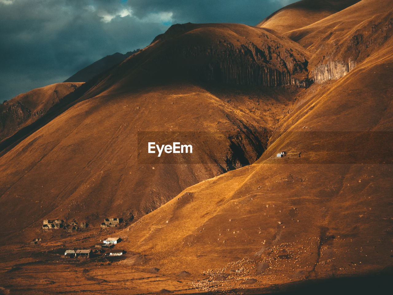 Scenic view of landscape and mountains against sky