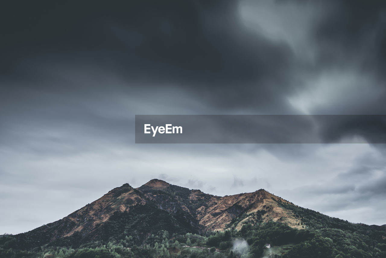 Low angle view of mountain against sky