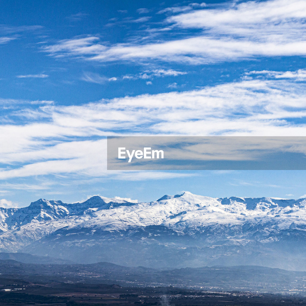 SCENIC VIEW OF SNOWCAPPED LANDSCAPE AGAINST SKY