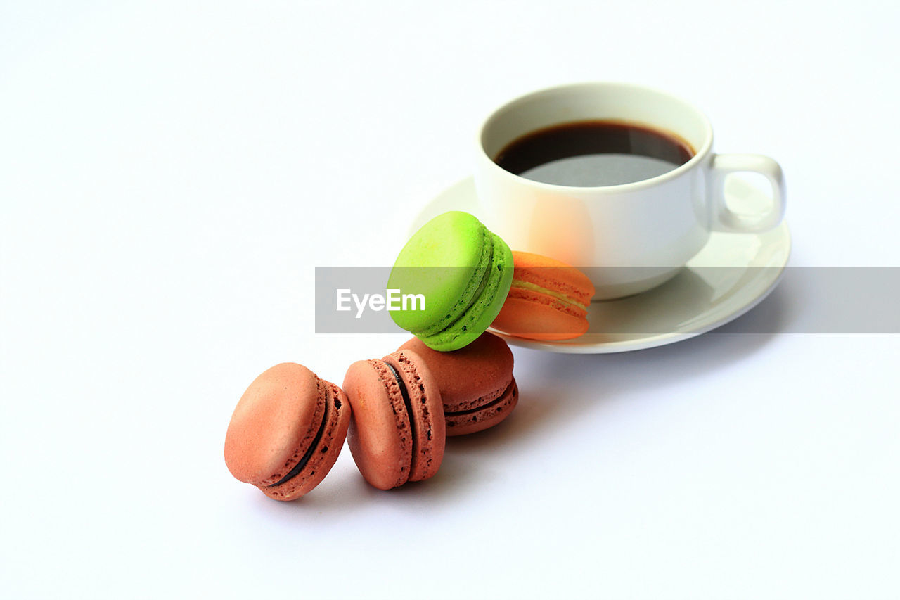 Close-up of coffee cup on white background