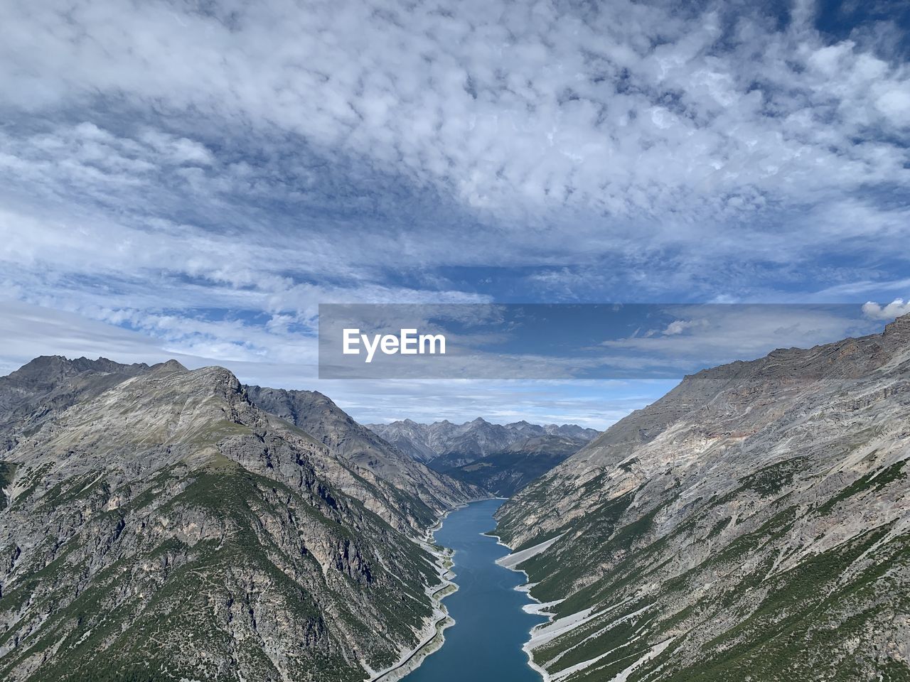 Panoramic view of mountains against sky