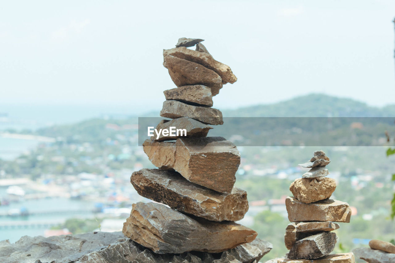 STACK OF ROCKS ON SHORE