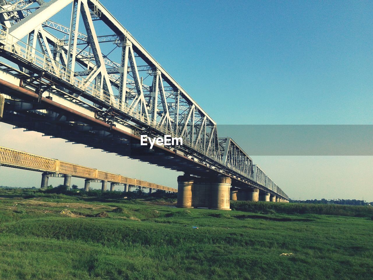 Low angle view of bridge against clear sky