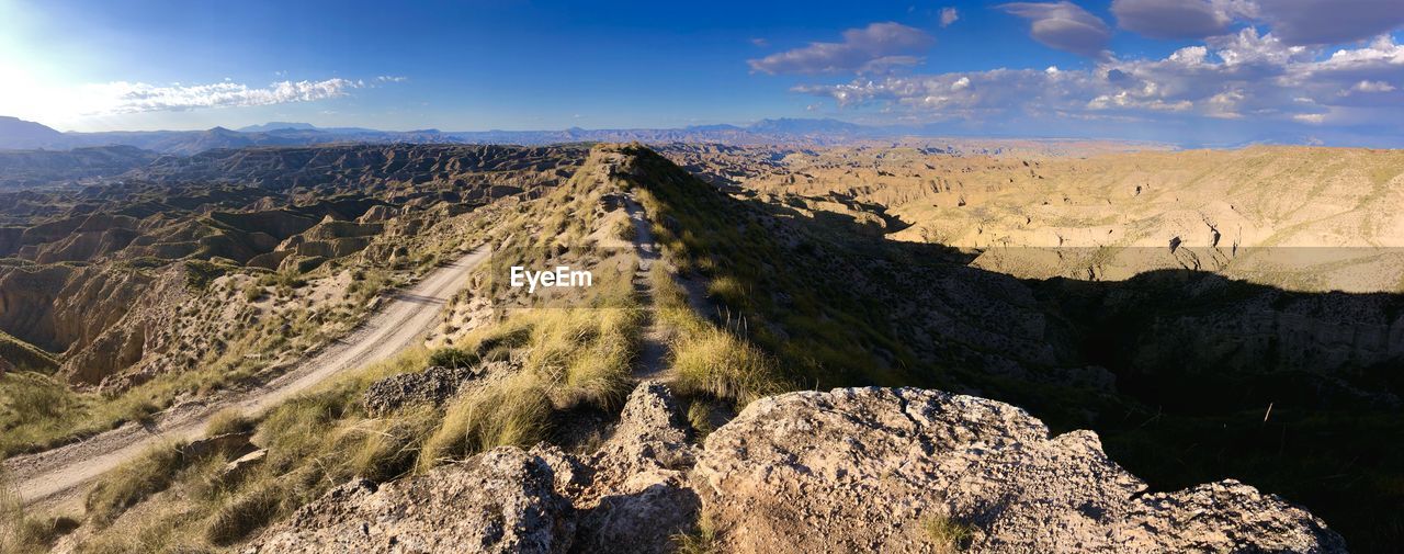 PANORAMIC VIEW OF LAND AGAINST SKY