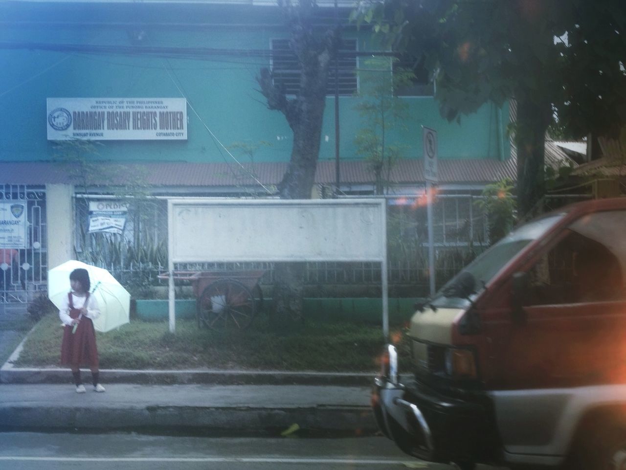 BLURRED MOTION OF PEOPLE ON ROAD