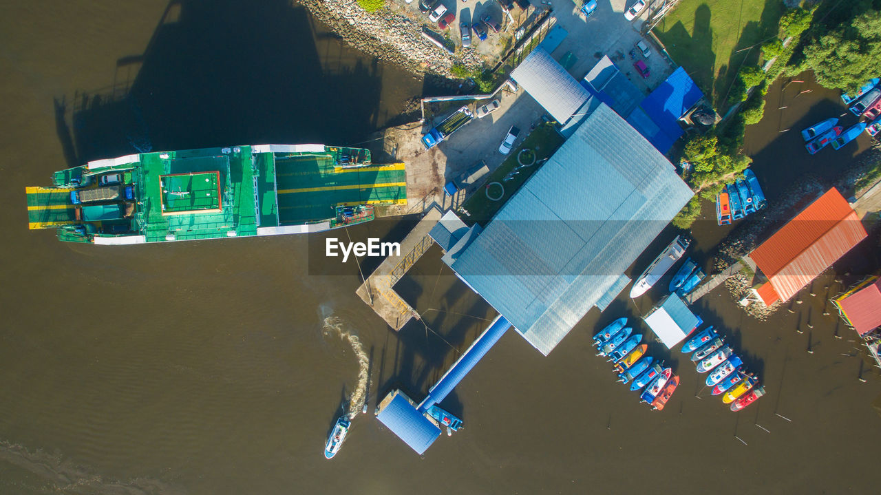 HIGH ANGLE VIEW OF BUILDINGS BY CITY