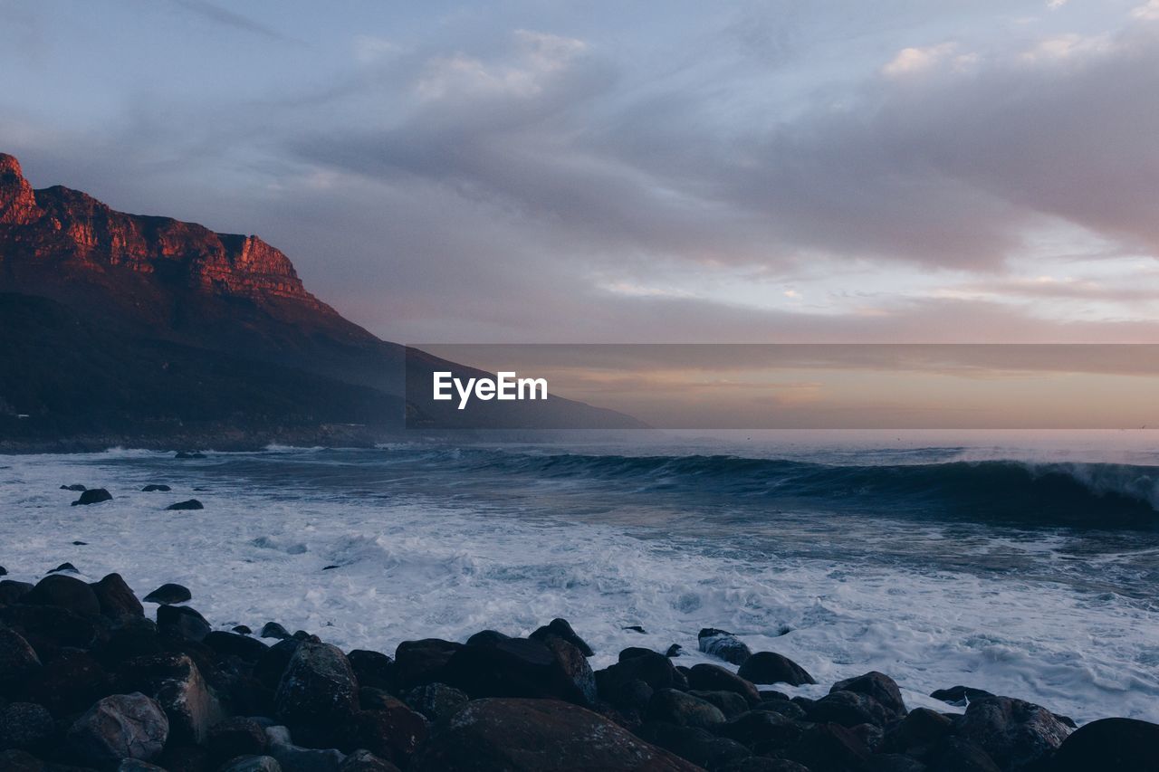 Scenic view of sea against sky during sunset