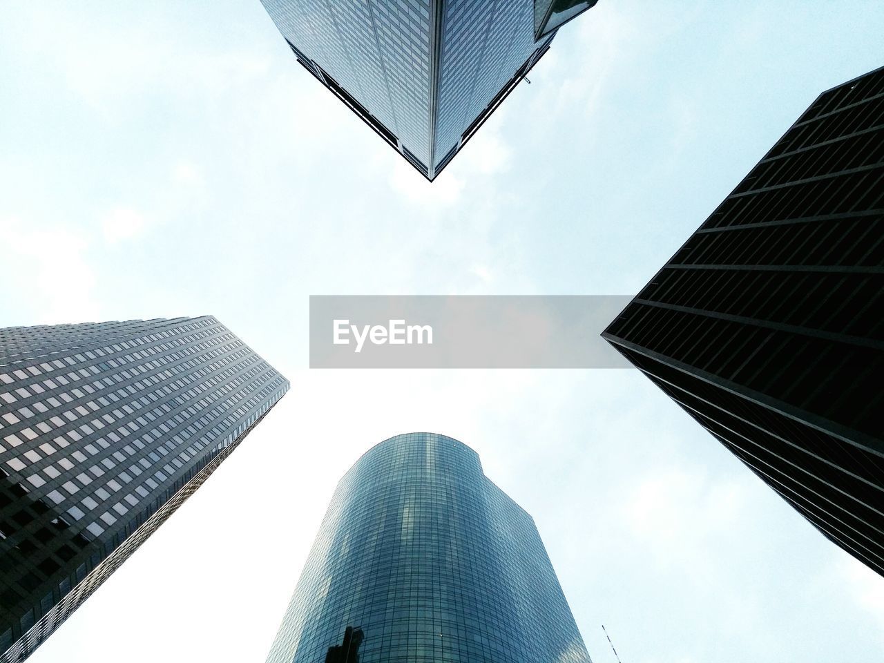 Low angle view of skyscrapers against sky