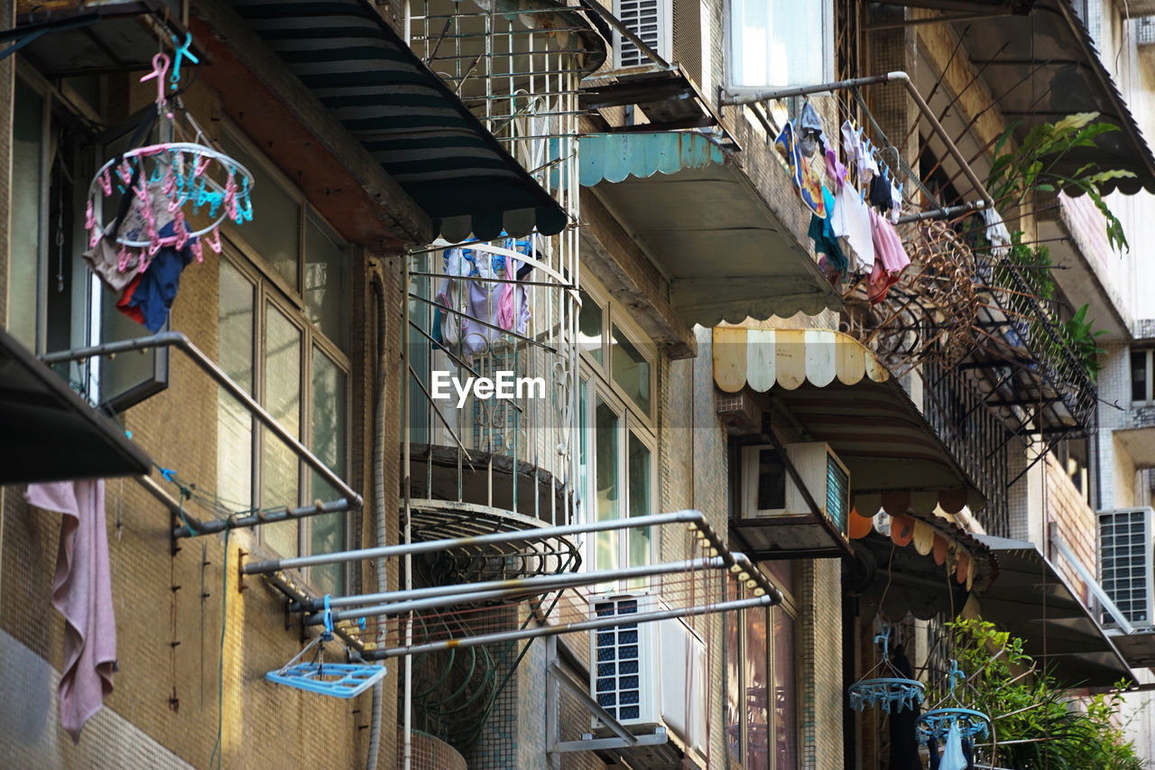Architecture Balcony Building Exterior Built Structure Clothesline Day Hanging Low Angle View No People Outdoors Residential Building