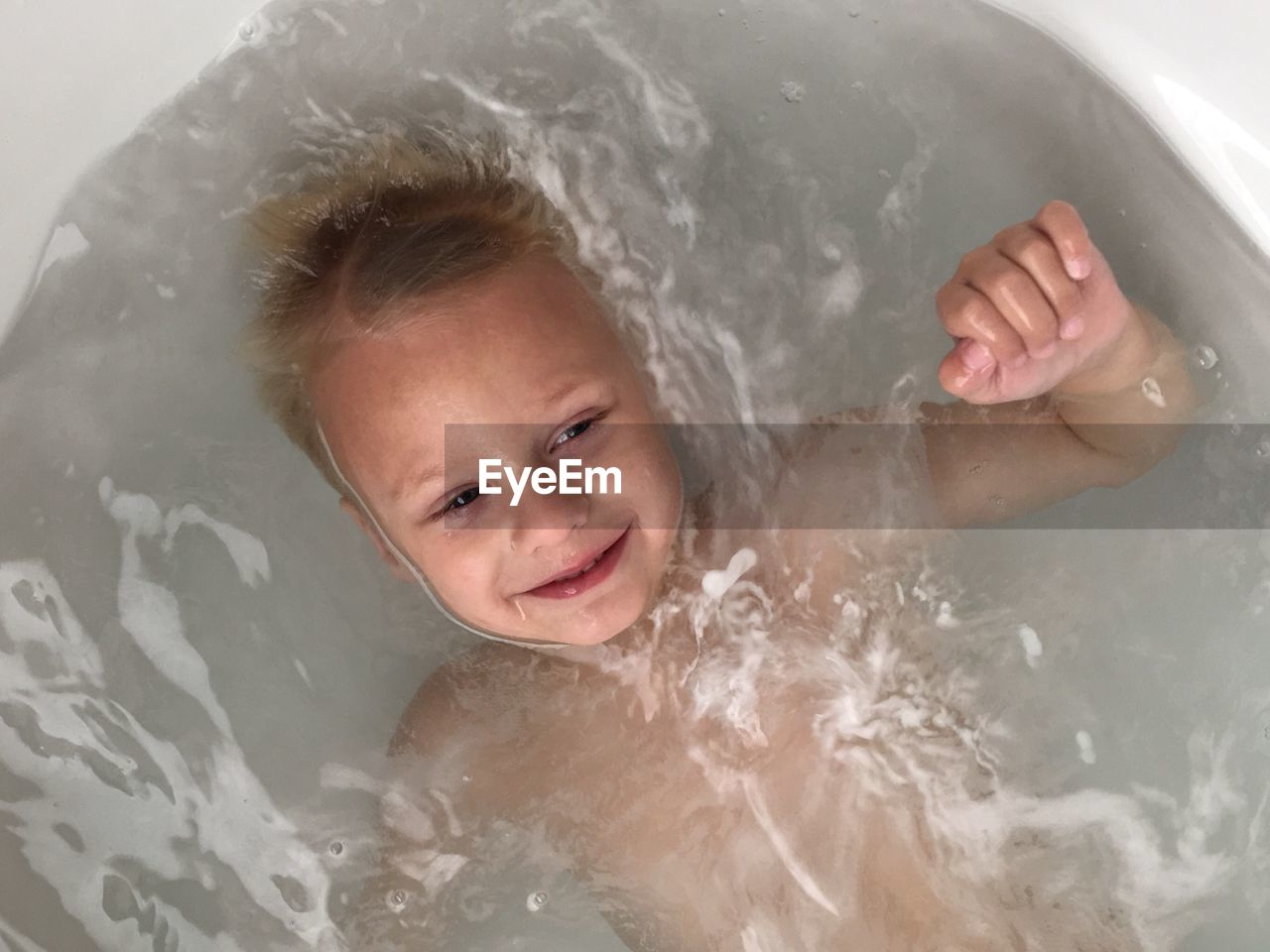 High angle view of boy in water
