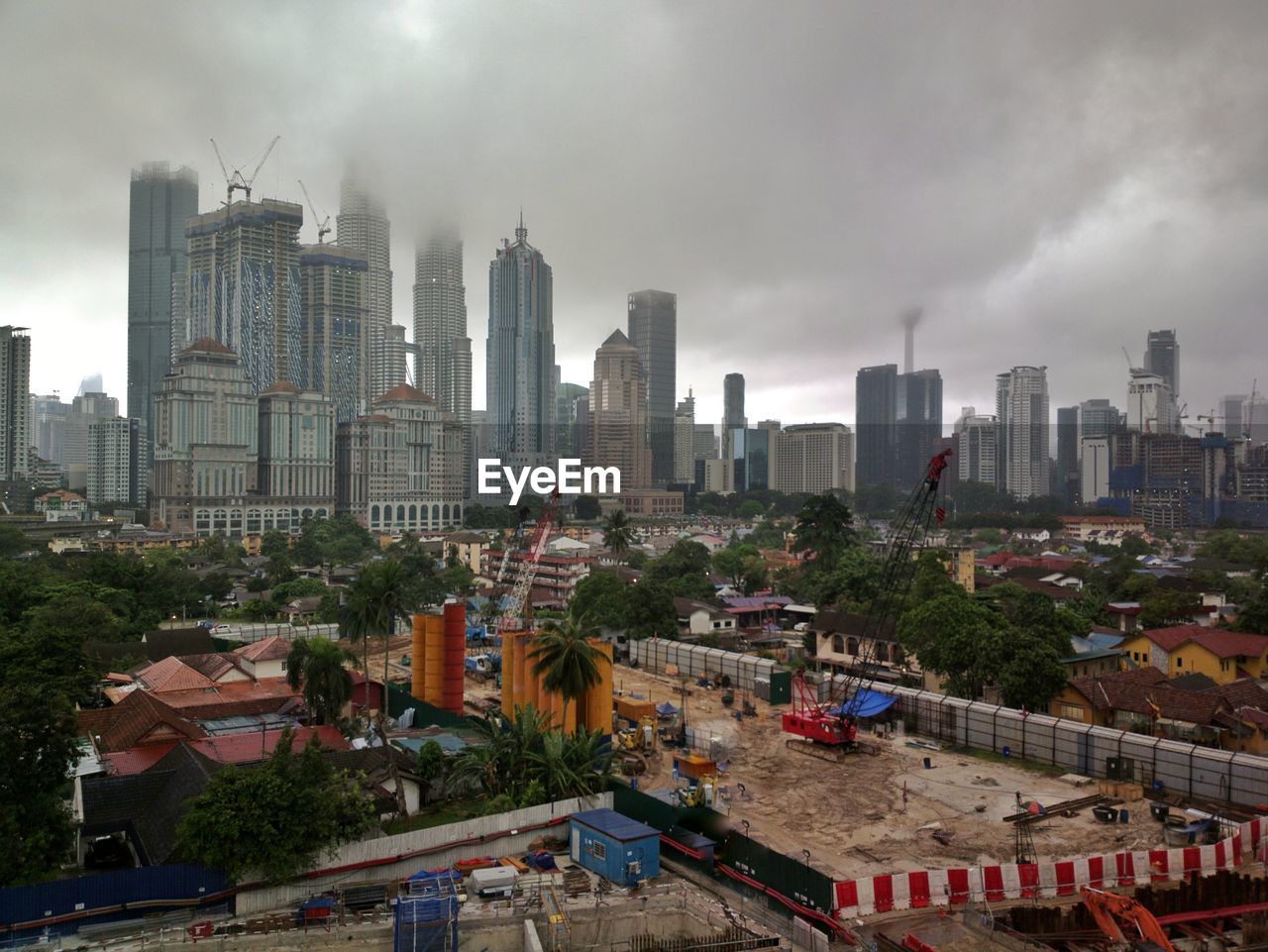 Modern buildings in city against sky