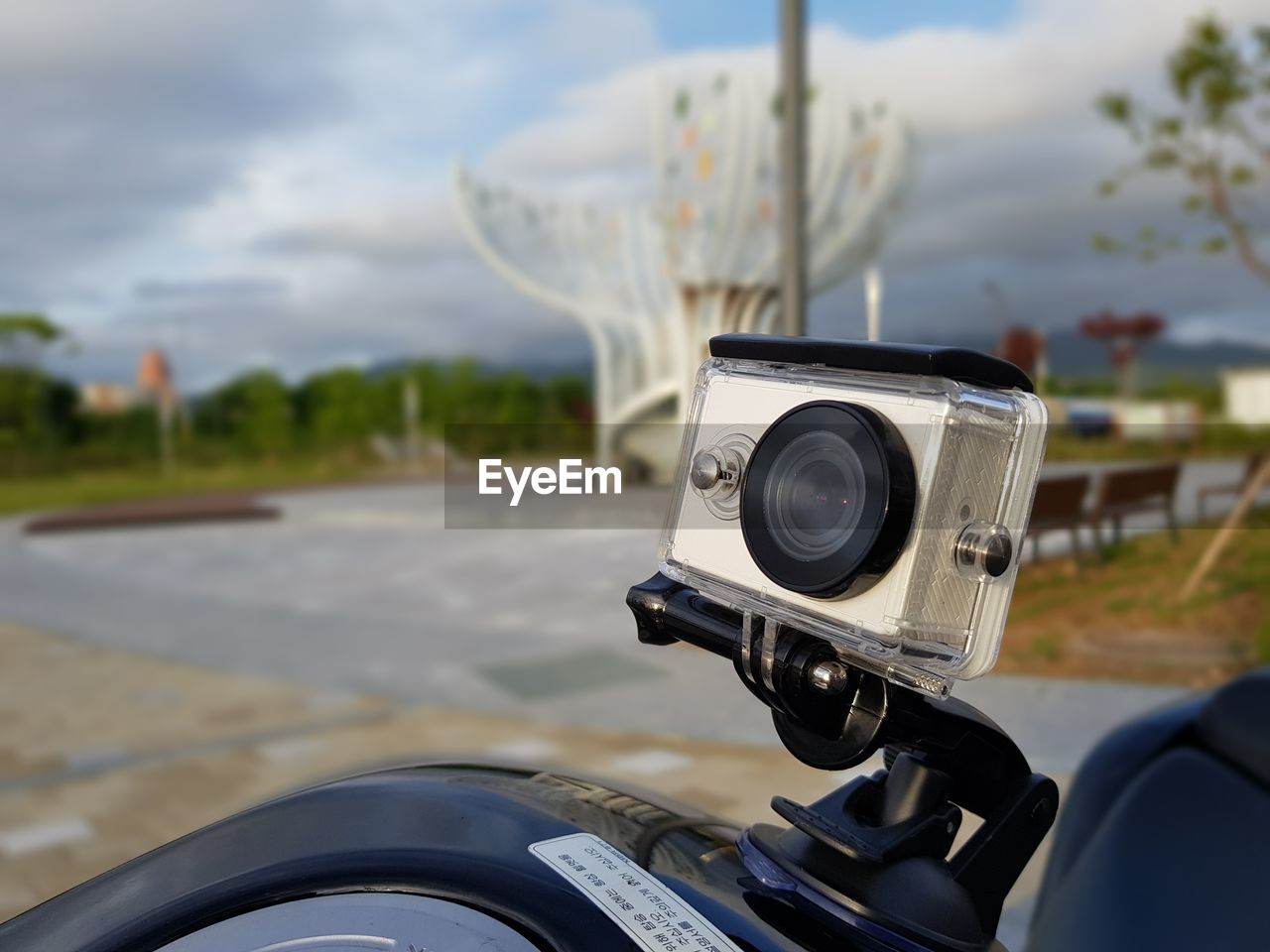 CLOSE-UP OF CAMERA ON ROAD