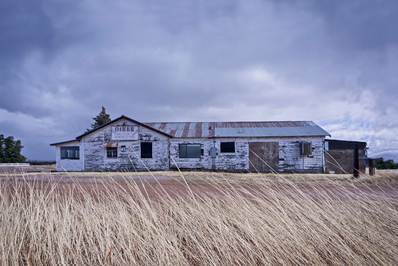 HOUSES AGAINST SKY