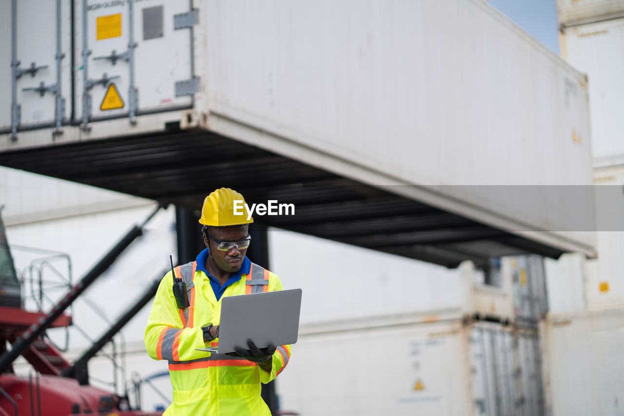 Man working on mobile phone